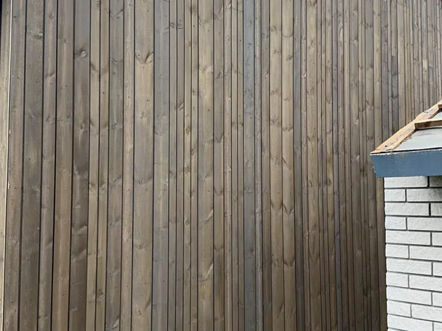 Ny stående trekledning på fasade